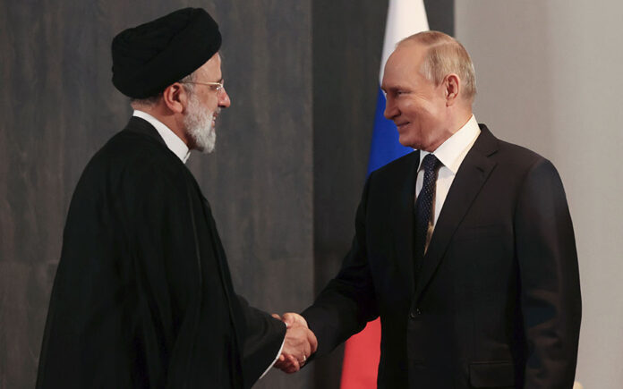 Ο Βλαντιμίρ Πούτιν και ο Εμπραχίμ Ραϊσί